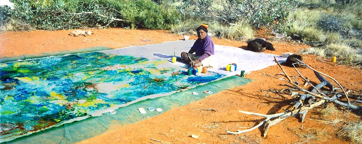 Emily Kame Kngwarreye in Utopia painting Earth's Creation